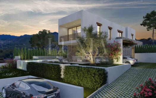 Villa de lujo estilo ibicenco con piscina infinita y vistas panorámicas en Jávea