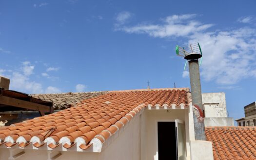 Casa adosada en venta en Benitachell con azotea y vistas panorámicas al mar.